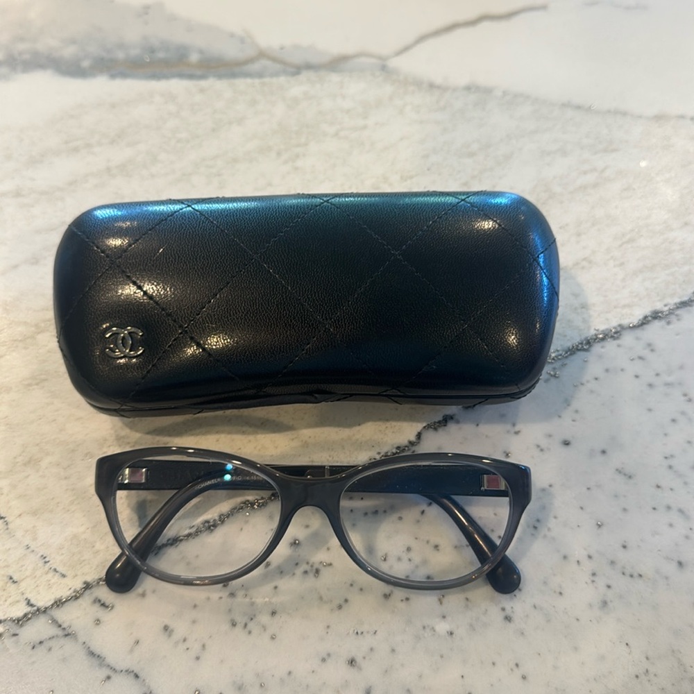 Grey Chanel prescription eye glasses.